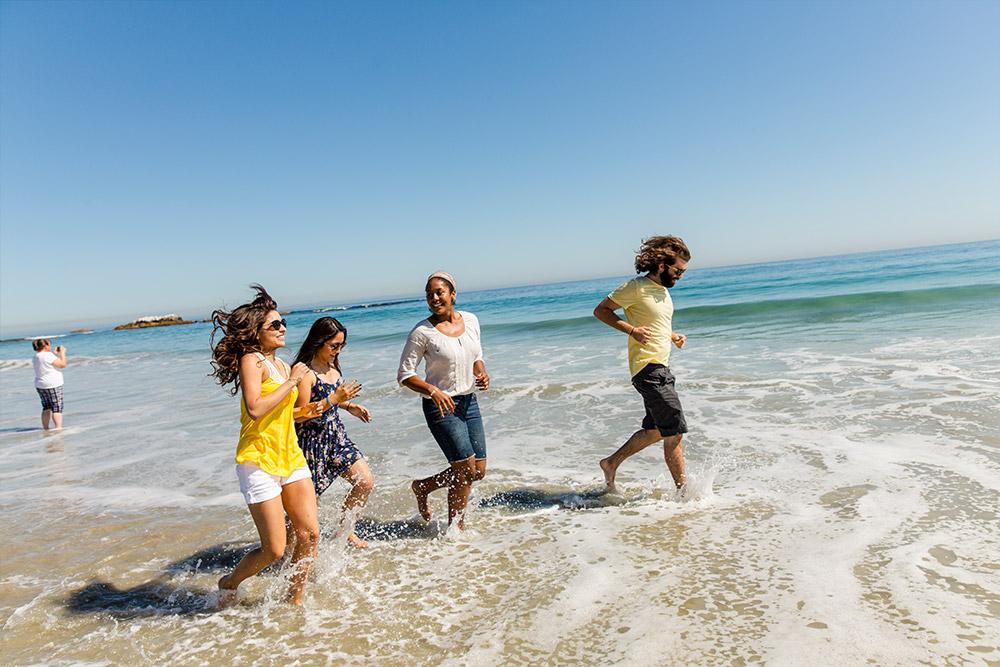 Students enjoy a day at the beach.