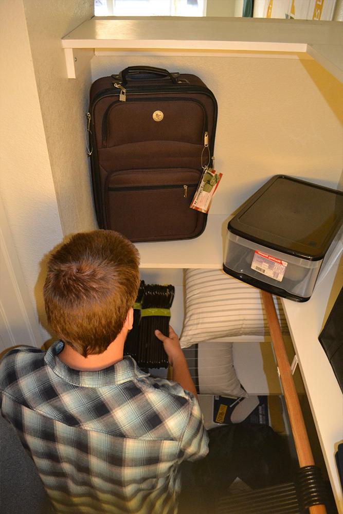 An overhead view of a dorm walk-in closet