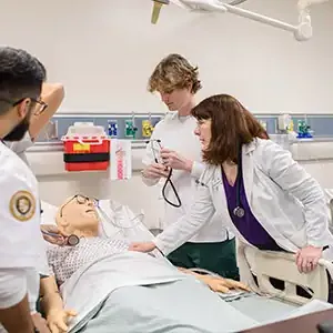 Two people having a conversation in a hospital